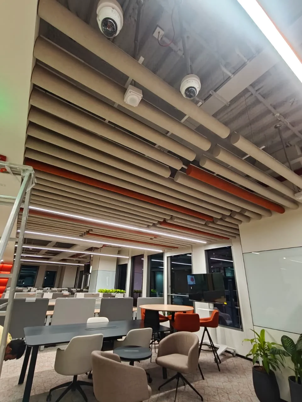 Linear ceiling baffles in a commercial workspace