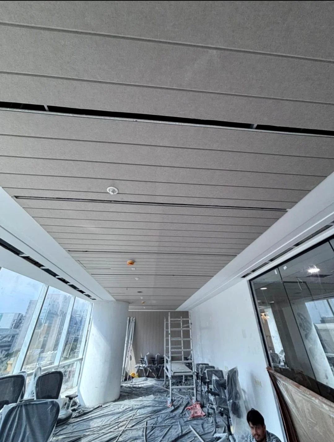 Linear ceiling treatment in a workspace